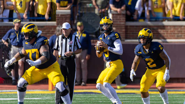 Sep 9, 2023; Ann Arbor, Michigan, USA; Michigan Wolverines quarterback J.J. McCarthy (9) looks down field against the UNLV Rebels during the first half at Michigan Stadium. Mandatory Credit: David Reginek-USA TODAY Sports
